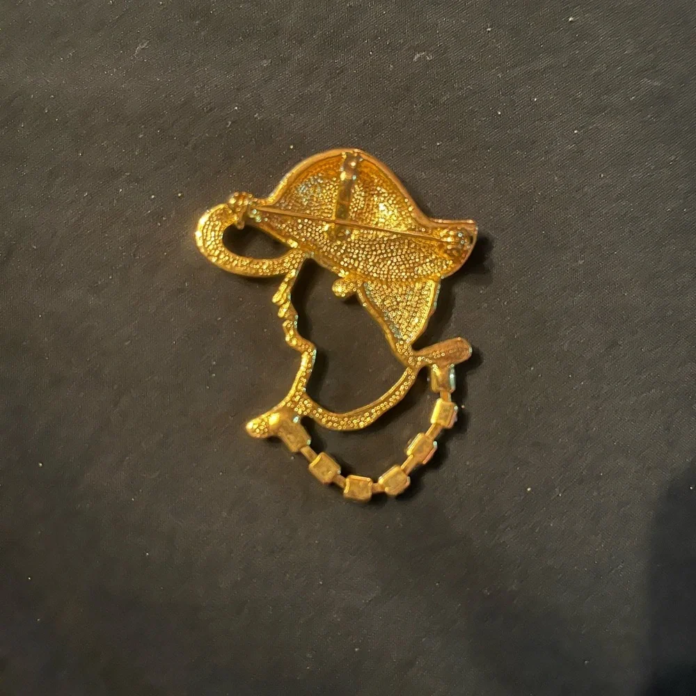 Vintage Unique Lady in Profile Brooch with Red enamel and dangling rhinestones